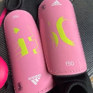 Girls adidas cleats and adidas shin guards
